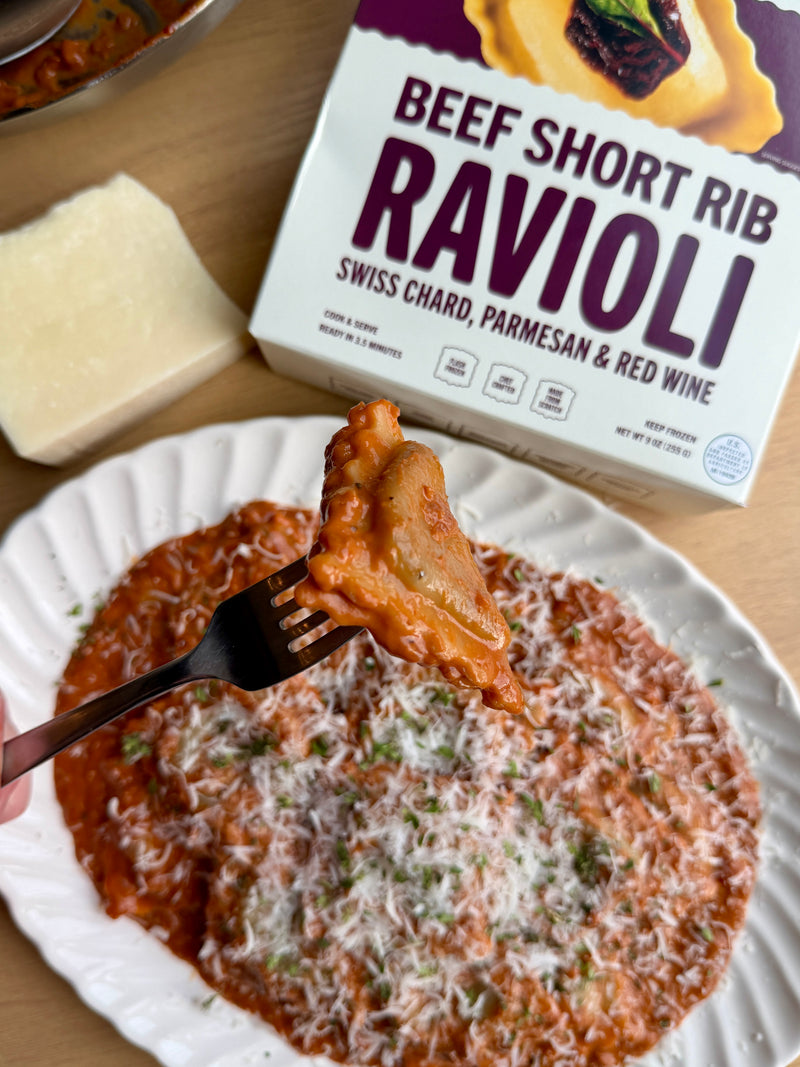 Beef Short Rib Ravioli with Caramelized Onions and Tomato Sauce
